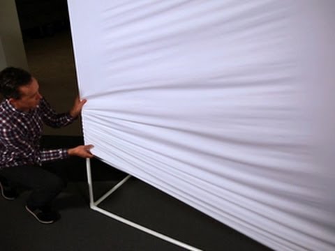 Can you use a white sheet for a projector screen?